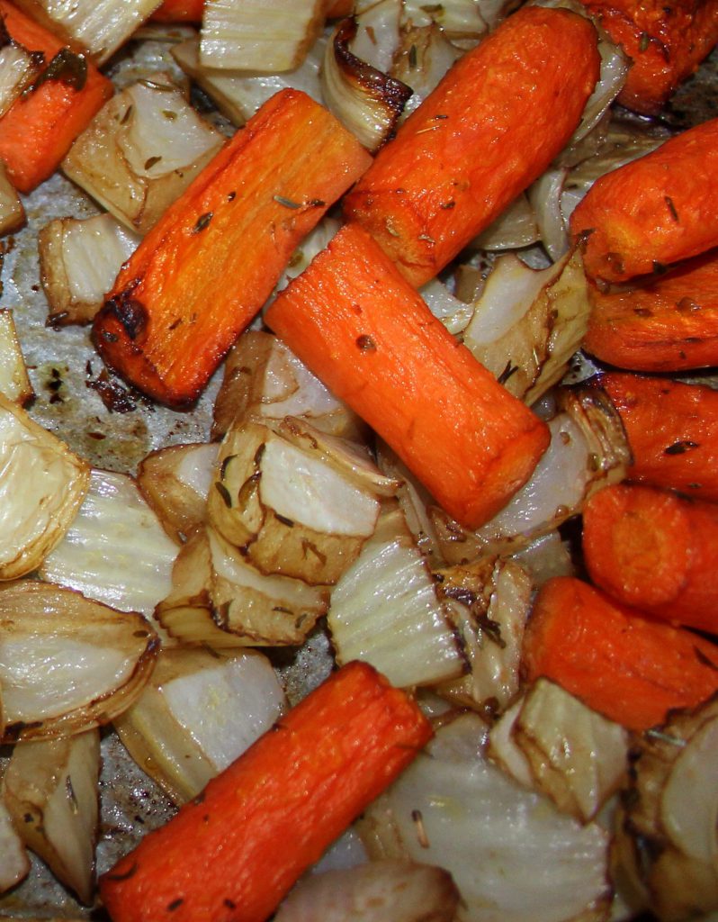 Caramelized oven-roasted vegetables in close up