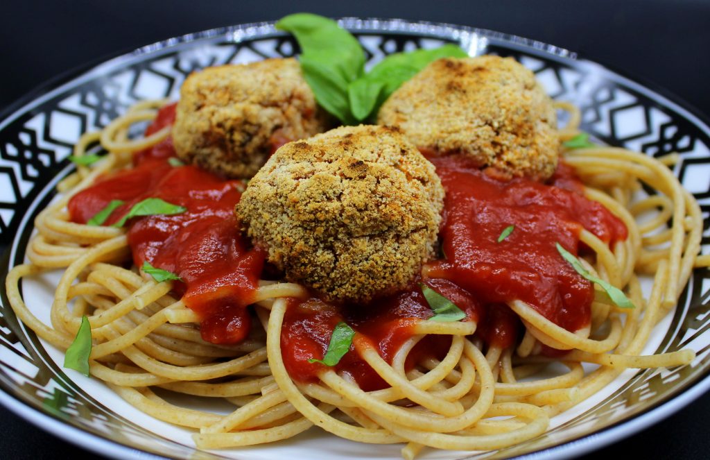 Spaghetti with vegan meatballs in closeup