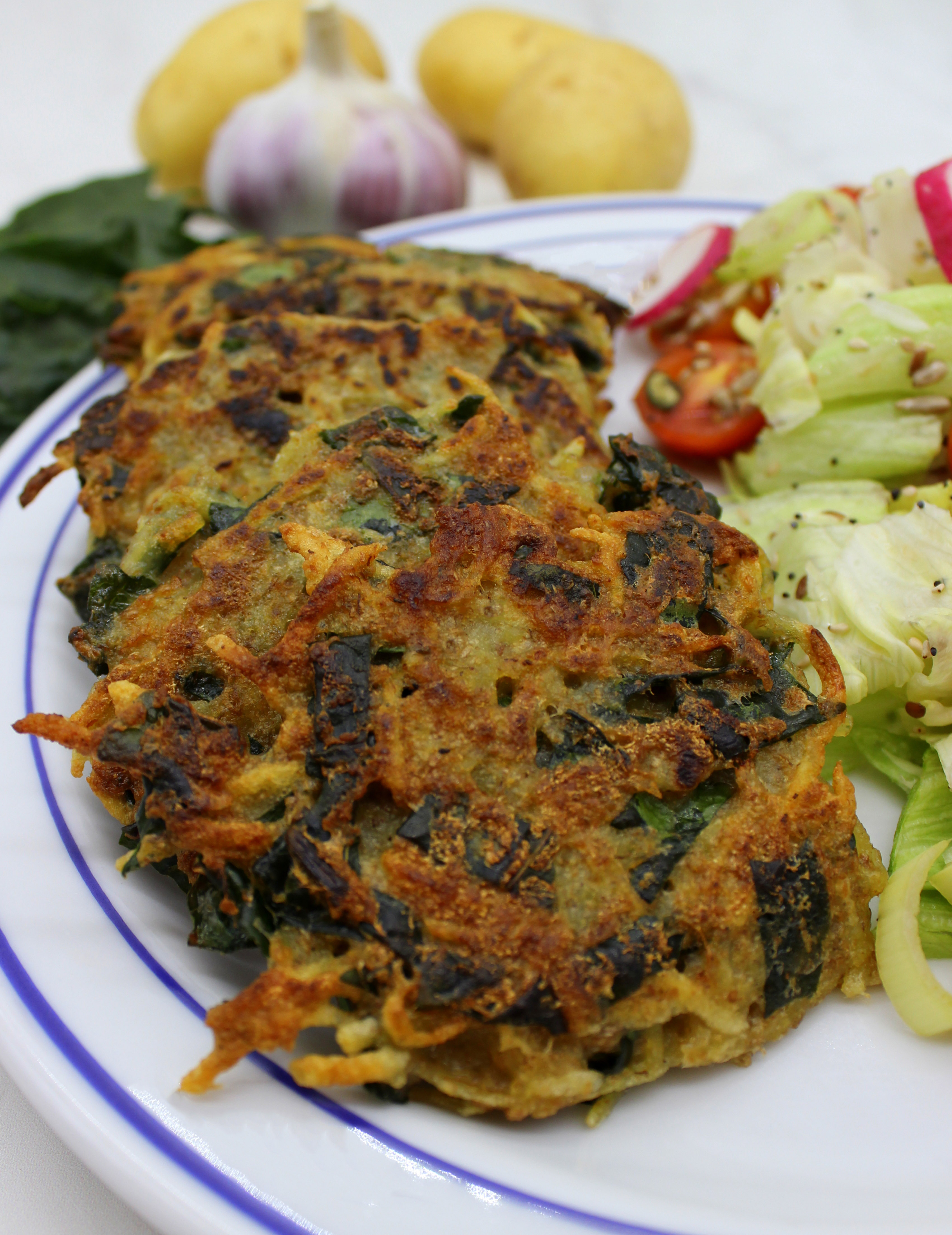 Potato and spinach vegan pancakes in close up