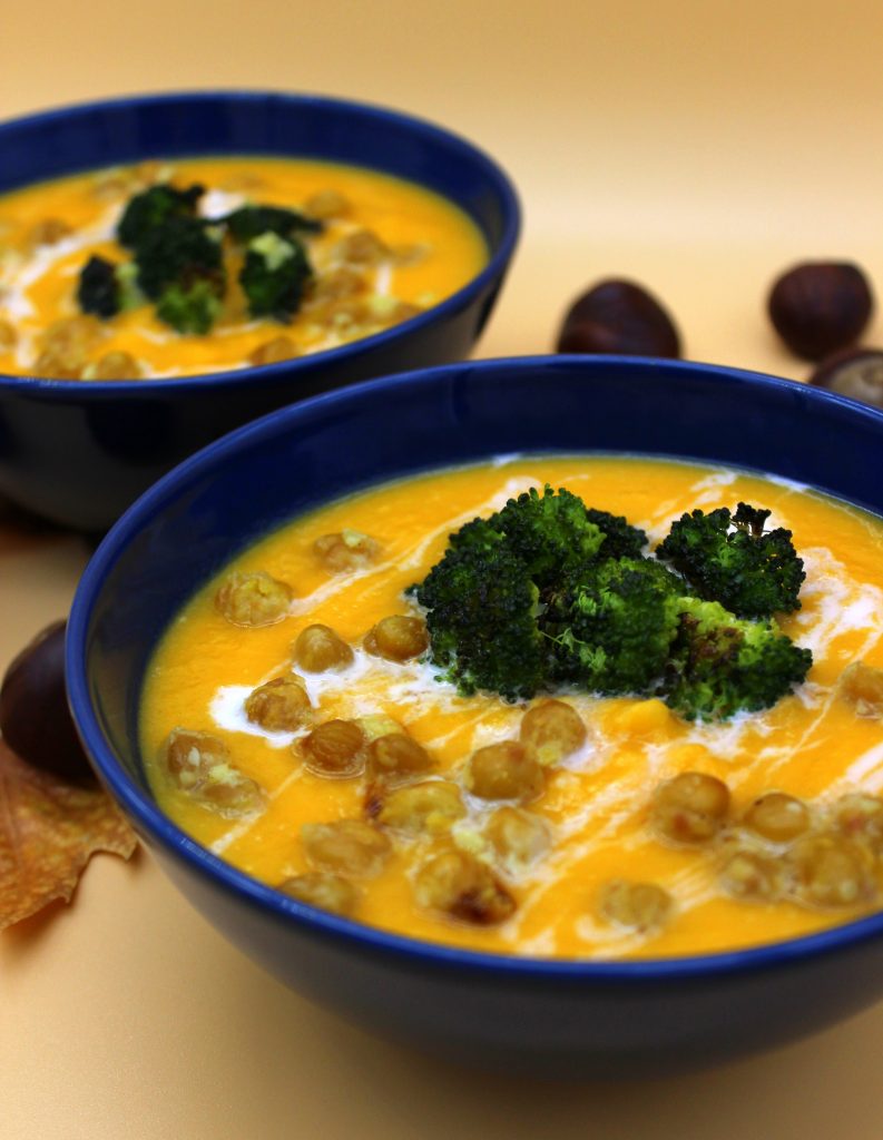 Creamy vegan pumpkin soup with roasted chickpeas and broccoli