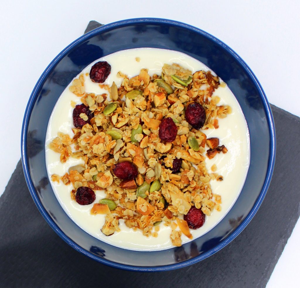 Bowl of vegan granola with yoghurt
