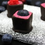 Vegan chocolate berry cups in close-up